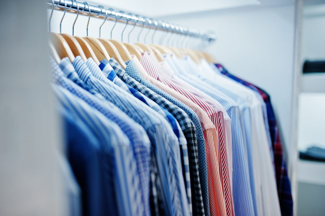 Pressed shirts hanging after drycleaning