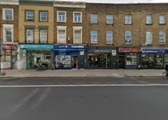 Chambio Dry Cleaners storefront viewed from Holloway Road