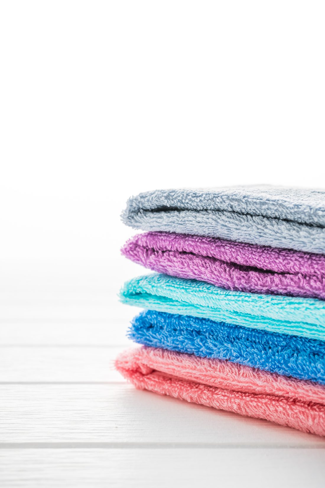 Freshly cleaned towels, folded and ready for delivery